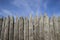 Close up on an old fence made of logs, Protective structure for the protection of a wooden fortress. Fence and strengthening of th