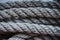 Close-up of an old frayed boat rope as a nautical background