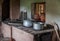 Close up of old furnished kitchen in the village house.