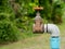 Close up old grunge brass faucet water in nature park background