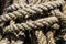 Close-up, an old knotted rope