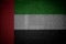 Close up on an old metal grid vintage United Arab Emirates national flag