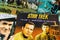 Close up of old movie soundtrack vinyl record album covers with focus on Star Trek