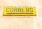 Close-up of an old poster of the Spanish company Correos