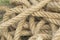 Close-up of an old rope as a grass background, rope cluster