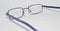 Close up of an old scratched up pair of children`s prescription glasses