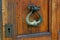 Close up of old wooden door handle in ortodox church