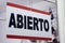 Close-up of an open sign in spanish. `Abierto`