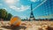 Close-up of an orange volleyball on sandy court in Paris, with Eiffel Tower in the background, Summer Olympics in 2024