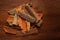 Close-up of Organic cinnamon  Cinnamomum Verum or dalchini on wooden top background. Pile of Indian Aromatic Spice.