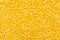 Close up of Organic yellow Gram Vigna radiata or split yellow moong dal Full Frame Background.