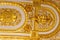 Close-up of ornate gilded golden ceiling
