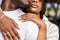 Close up outdoor protrait of african american couple embracing each other