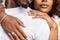 Close up outdoor protrait of african american couple embracing each other