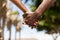 Close up outdoor protrait of african american couple holding hands