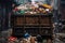 close-up of overflowing dumpster with mixed waste