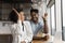 Close up overjoyed African American couple giving high five