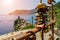 Close Up of Padlocks Hanged on a Iron Railing on the Town of Vernazza Background