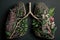 close-up of a pair of lungs made from delicate flowers and greenery