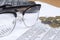 Close up of a pair of spectacles on an account\'s desk