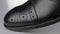 Close-up. Panorama from toe to heel of black classic men\'s shoes.