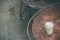 Close up paper cup on the rusty table