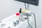 Close up part of Professional EVO ENT Medical Devices Workstation. Ear Nose and Throat Medical equipment. Washing syringe. Selecti