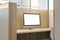 Close up of partitioned wooden workplace with empty white computer screen and mock up place.