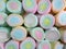 Close-up of Pastel Yellow, Pink, Blue Colored Marshmallows for Background