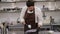 Close-up of a pastry chef or chocolatier making chocolates with purple dye.