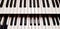 Close up pattern of old or dirty piano keyboard for background