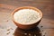 Close up of Pearl Barley in a Earthen Bowl on Wooden Background