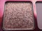 A close-up of pearlescent shimmery pink eyeshadow for creating eye makeup.  Beauty concept