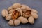 Close-up pecan nuts on dark background