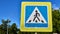 close-up of the pedestrian crossing sign. color