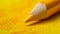 Close-Up of Pencil on Yellow Surface