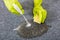 Close-up Of Person Hand Spraying Detergent On Carpet