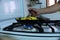 Close-up of a person making a potato omelet on a butane stove