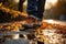 Close-up of a persons feet walking on a winding road - stock photography concepts