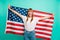 Close up photo beautiful she her lady arms hands hold spread big american flag yelling festive mood crazy carefree