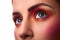 Close-up photo of beauty pink and orange makeup