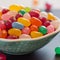 A close up photo of a bowl of jelly beans