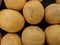 close up photo of a bunch of lemons in a basket