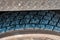 Close up photo of dirty big crane tyre background, contruction concept