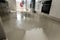 Close-up Photo Of Flooded Floor In Kitchen From Water Leak