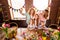 Close up photo foxy three small girls children day easter two mommy pretty table full handmade craft big wooden have