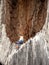 Close Up Photo, Gadget Addicted young Man, Holding Smartphone, sitting at hole of Wooden Door