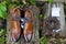 Close-up photo of groom`s shoes, cufflinks, belt and bow tie on