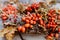 Close up photo of handmade colorful floral autumn door wreath