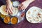 Close up photo of Indian traditional vegetarian thali from rice, dal, potatoes, tomato salad on metal plate ,female